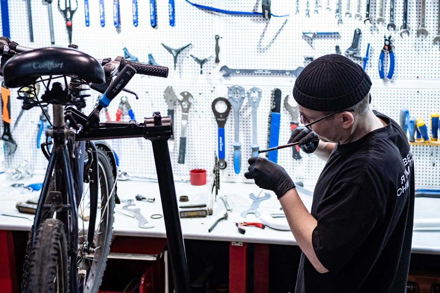 Professional mechanic helping with a repair
